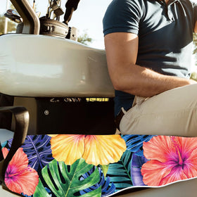 ORIGACH tropical-leaf design blends with golf course scenery.