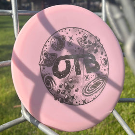 OTB Glo ESP Buzzz pink disc glowing in dark for accurate approach shots.
