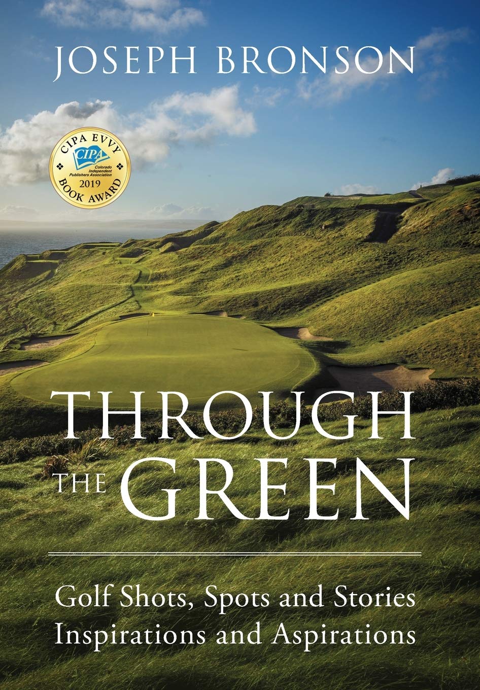 Outskirts Press Through the Green cover invites golf fans to explore stories and inspiration.