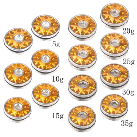 Two-piece 25g gold weights in packaging for quick swap