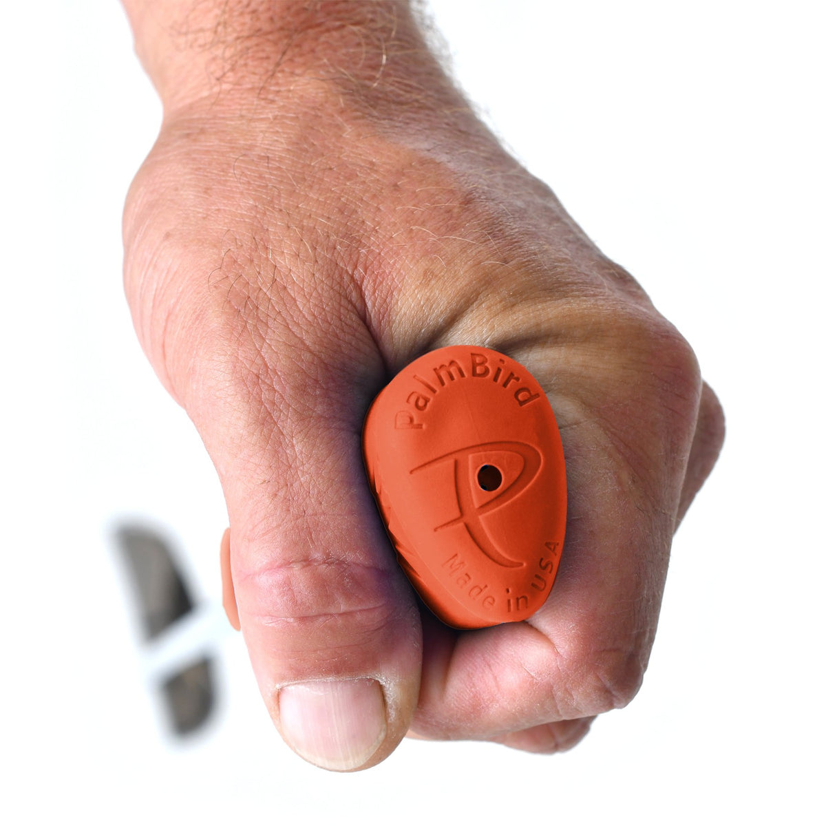 PalmBird orange grip on greens supports a smoother tempo and reduced wrist tension.