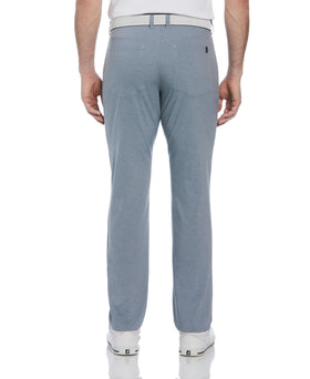 PGA TOUR Tradewinds HTR pants fabric texture close-up highlighting moisture-wicking for dry comfort.
