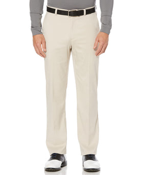 PGA Tour men's flat-front active waistband golf pants enabling flexible movement and all-day comfort.