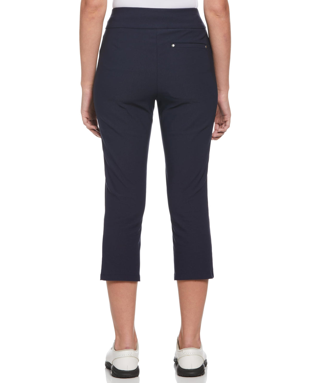PGA TOUR women's capri with tummy control for a smooth silhouette during swings.
