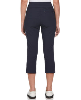 PGA TOUR women's capri with tummy control for a smooth silhouette during swings.
