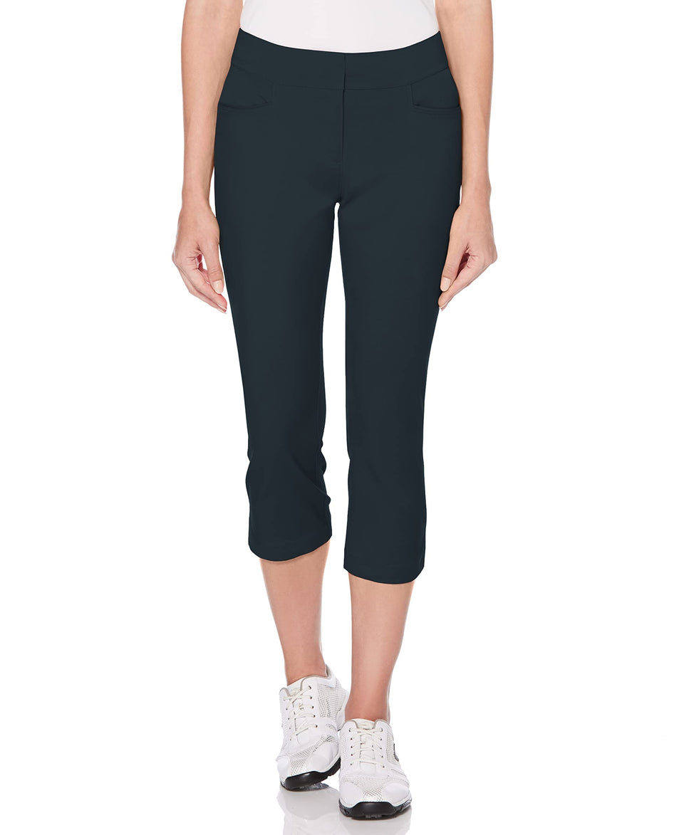 PGA TOUR women's woven capri pant Black Iris on course with moisture-wicking comfort.