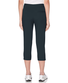 PGA TOUR capri pant Black Iris moisture-wicking close-up showing stretch fabric.