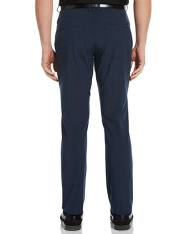 PGA TOUR men's flat-front dobby fabric pant in deep navy highlights a textured, refined look for active wear.