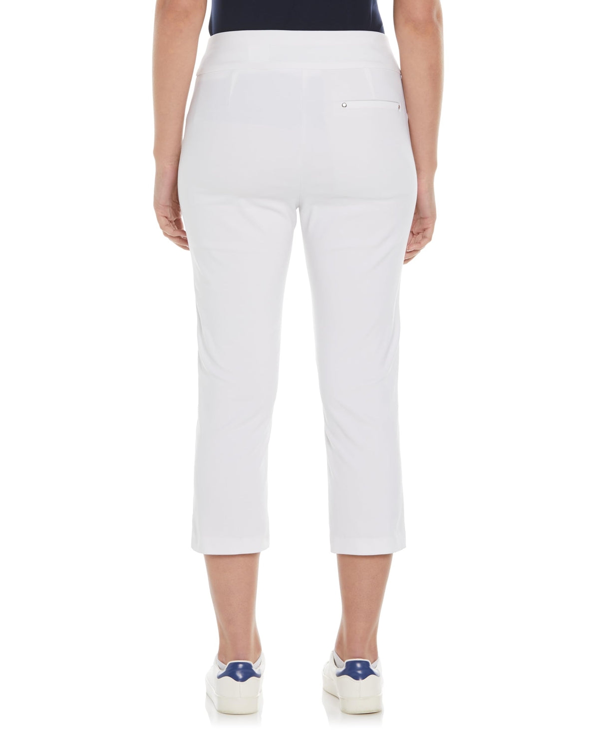 PGA TOUR tummy-control capri pants offer sleek silhouette while wicking moisture and protecting from sun.