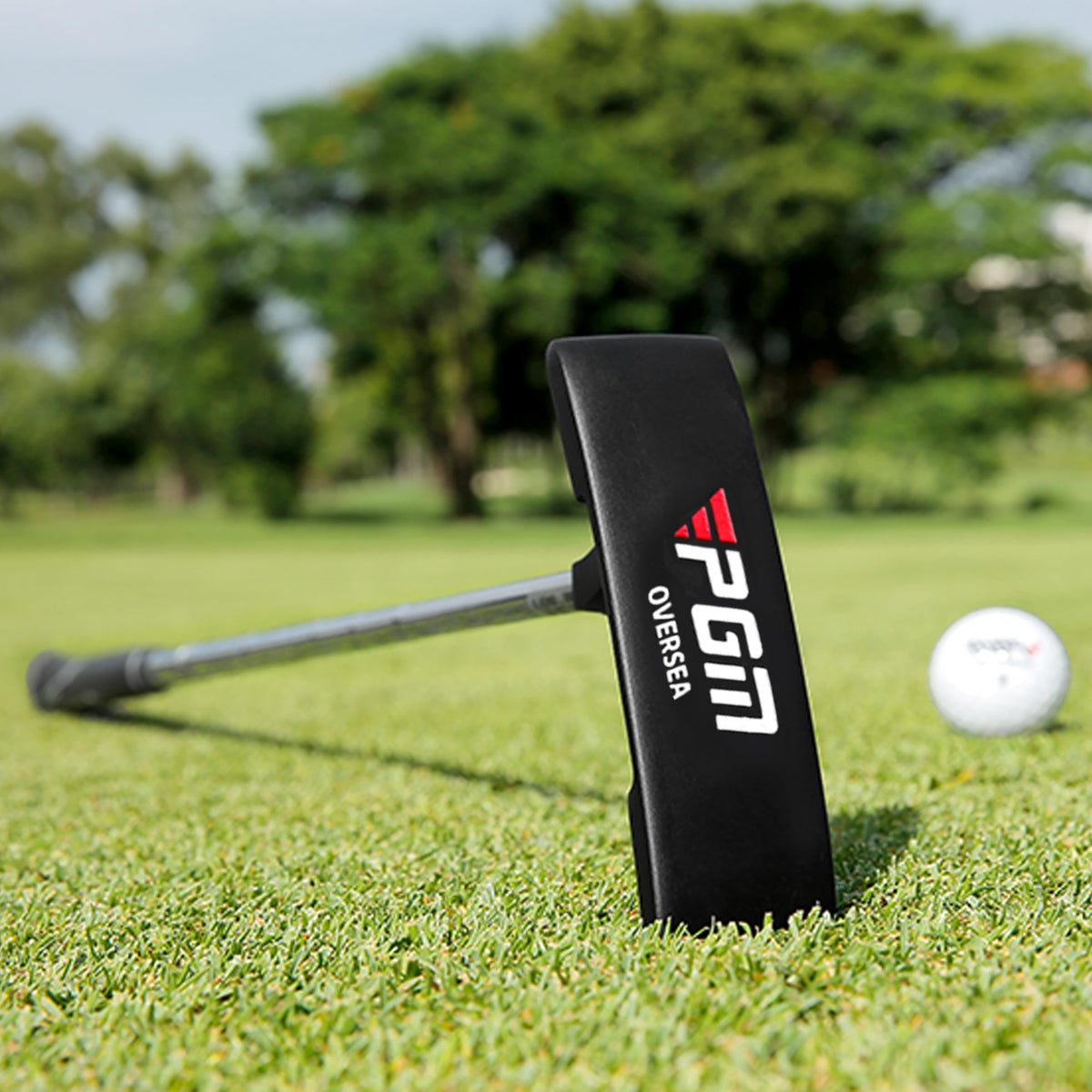 PGM Oversea putter in action on the green demonstrates alignment and control.