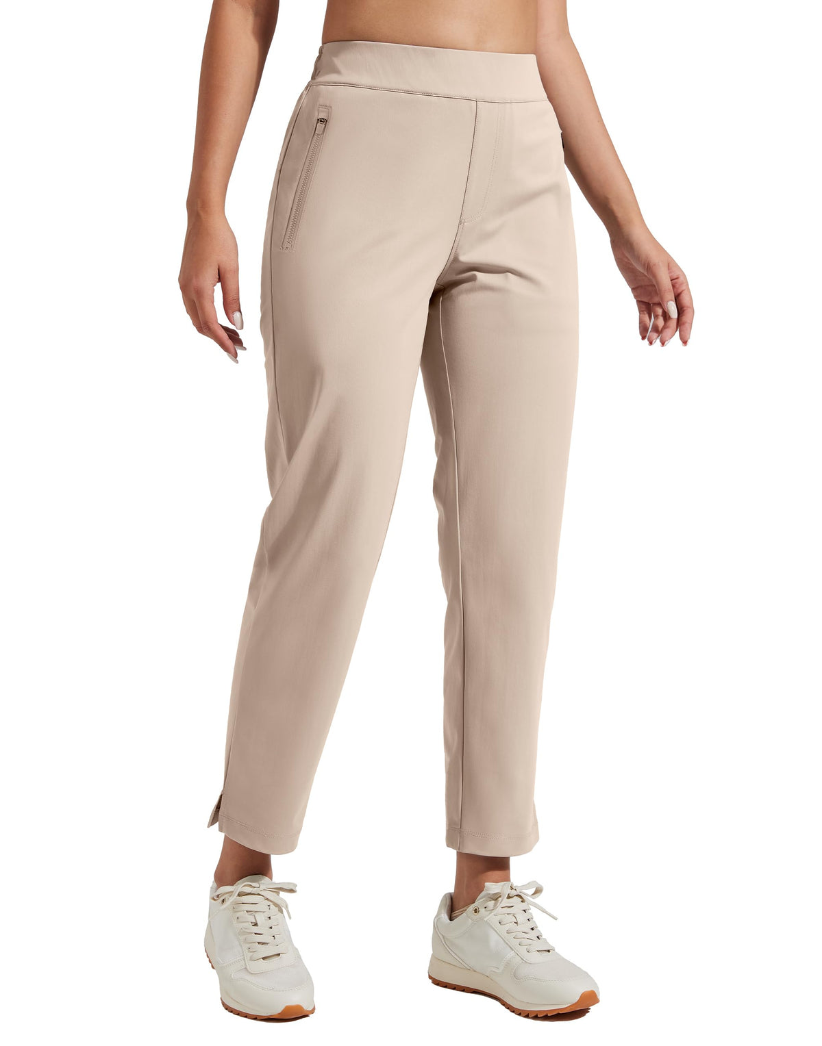 Pioneer Camp women's golf pants with zip pockets for secure storage on the course.