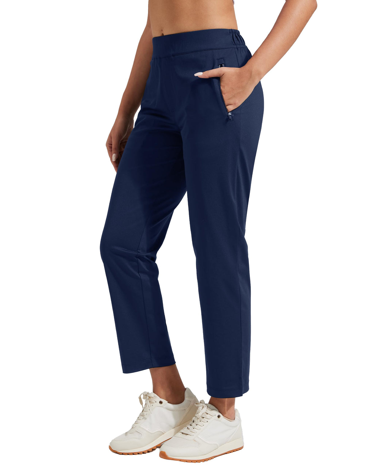 Pioneer Camp women's golf pants with zip pockets showing secure on course storage