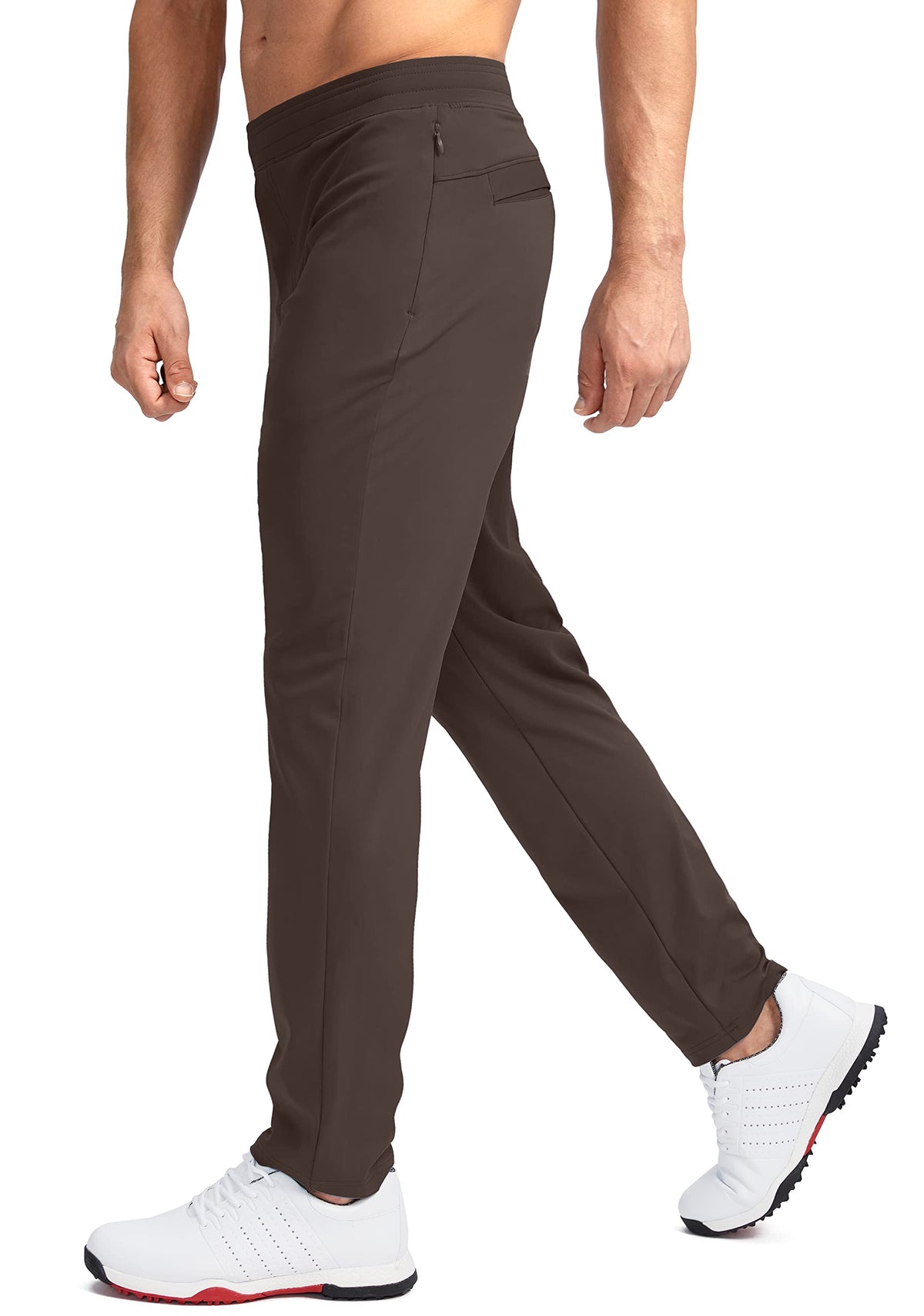 Pudolla pants featuring zip pockets securely holding phone and cards on course.