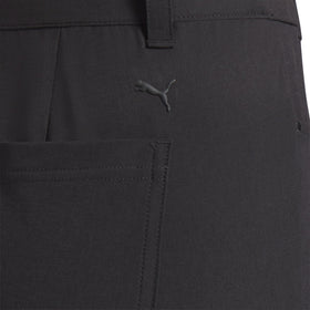 PUMA Avant Slim pants in black, side view showing flexible stretch.