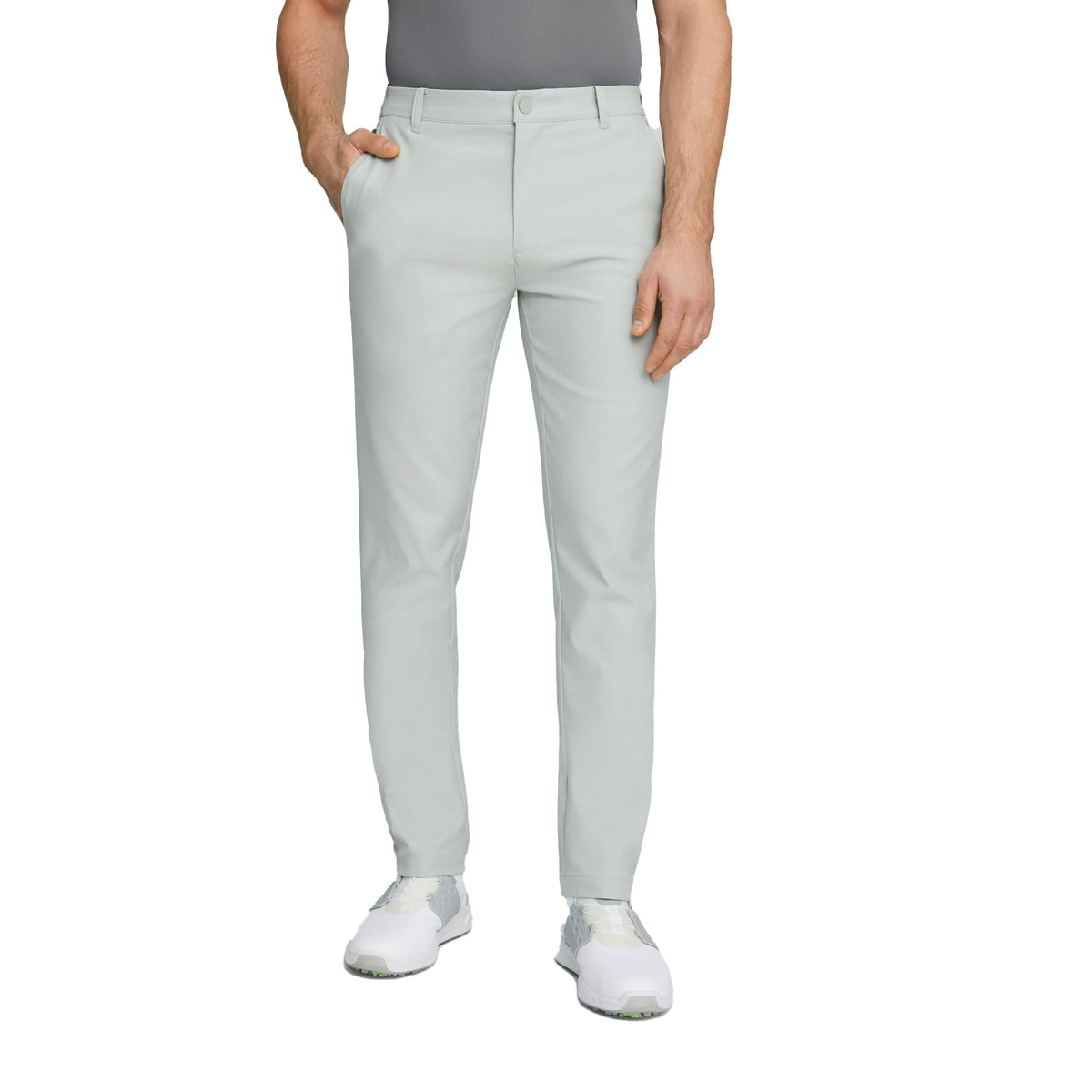 PUMA Dealer Tailored Pant fabric detail highlights premium breathable material for all-day comfort.