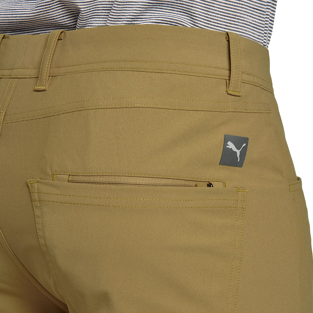 PUMA Golf 101 pant pocket detail reveals hidden stash pocket.