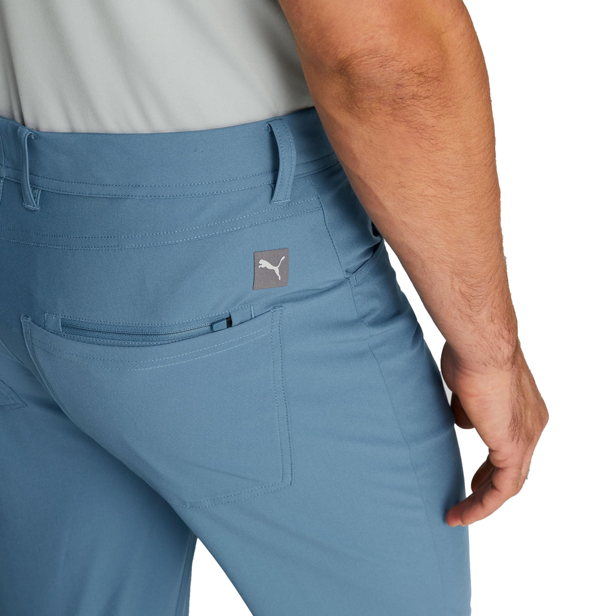 PUMA Golf 101 Pant side pocket detail for convenient on-course storage.