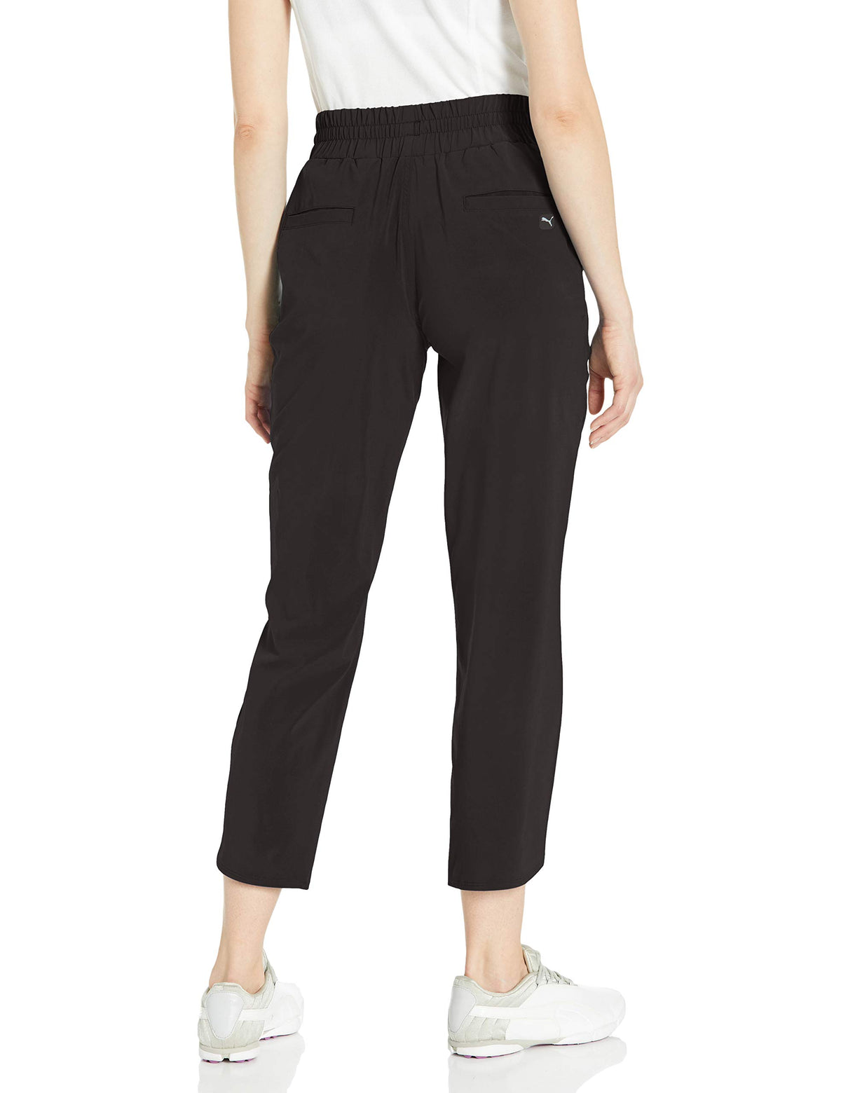 PUMA golf 2020 women's lightweight pant in black, side view, versatile on-course comfort.