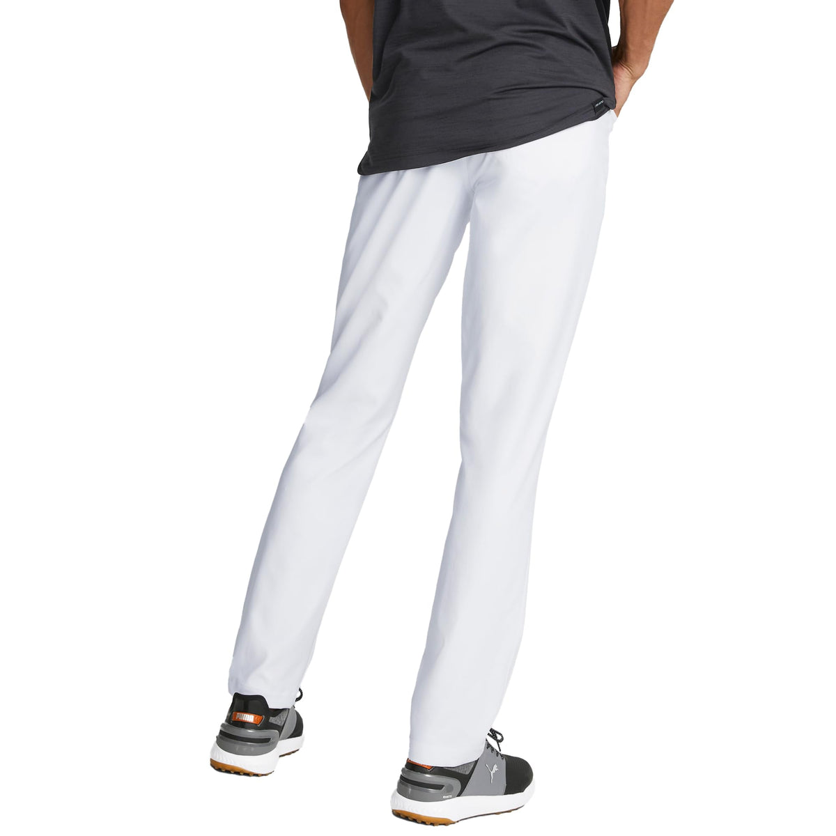PUMA Golf Dealer 5 Pocket pants side view showing stretch waistband for flexible fit