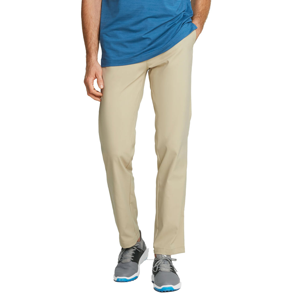 PUMA GOLF Dealer Pant Alabaster front view showing moisture-wicking fabric for all-day comfort.