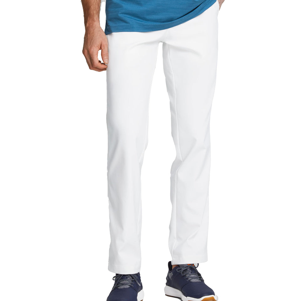 PUMA Golf Dealer Pant fabric closeup shows moisture-wicking texture for all day comfort