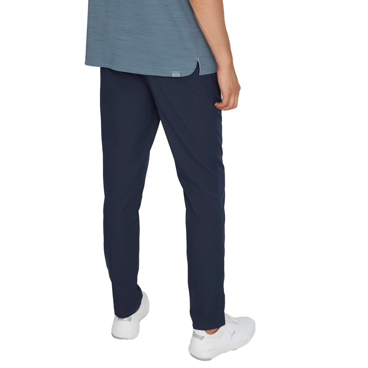 PUMA Golf Dealer Tailored Pant navy blazer side view highlighting stretch.