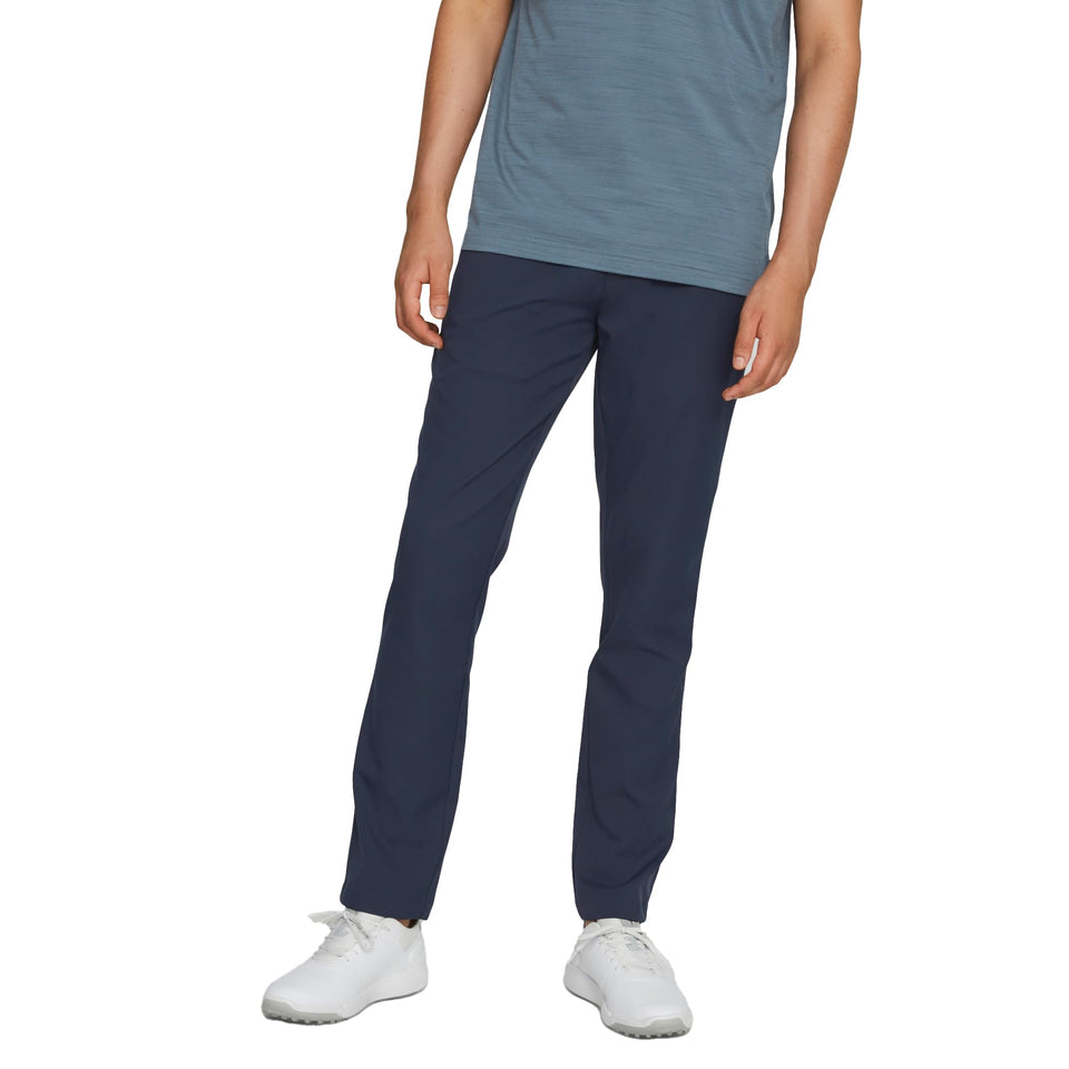 PUMA Golf Dealer Tailored Pant front view showing sleek navy fit and mobility