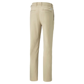 PUMA Golf Womens Dealer Tailored Pants Alabaster in action on course for flexible performance.