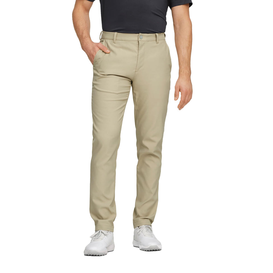 PUMA Golf Womens Dealer Tailored Pants Alabaster front view showing sleek, versatile golf-to-office fit.