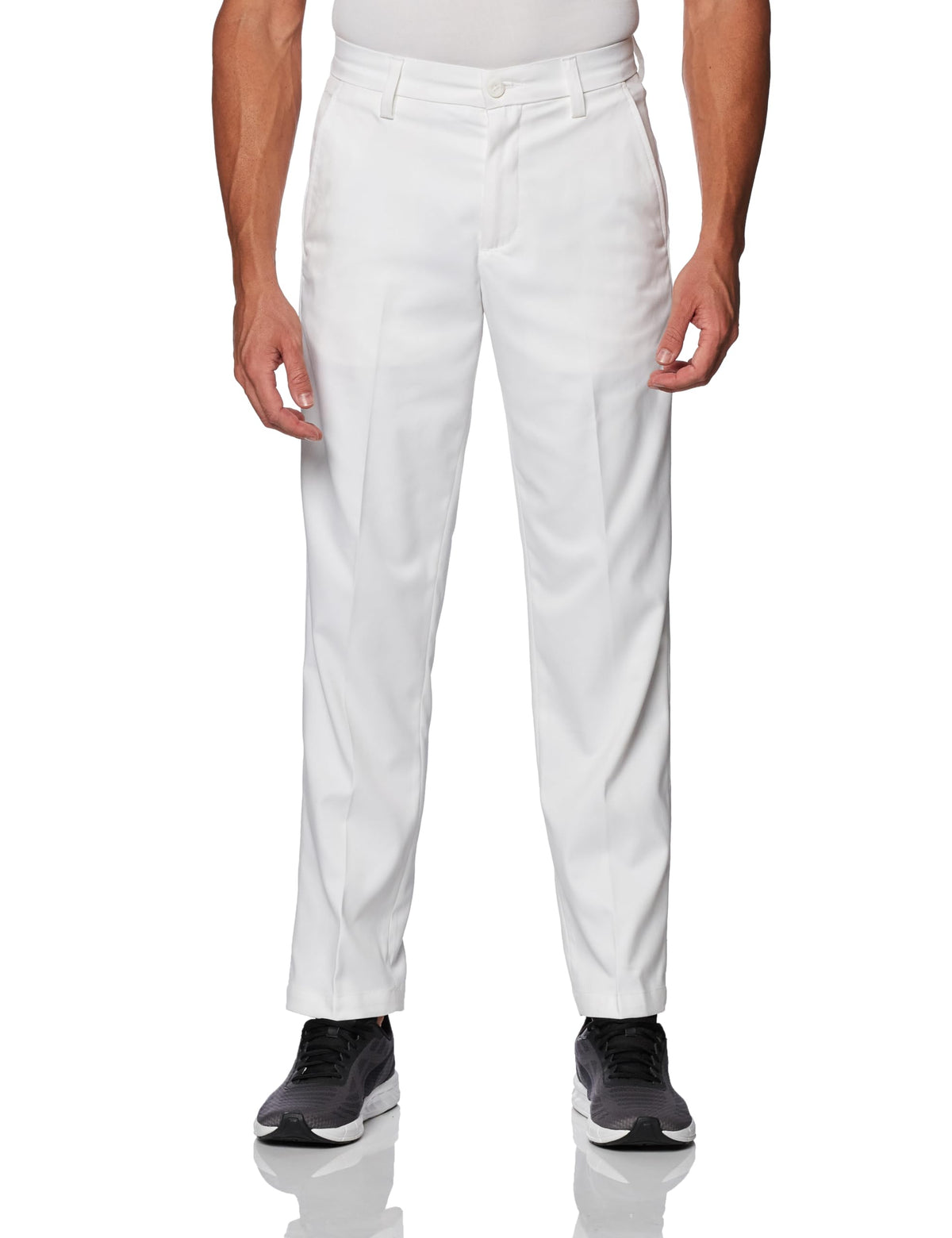 PUMA Jackpot pants on model in bright white for on-course style and comfort.