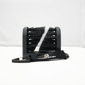Range Brush fold-out spikes deploy for turf anchoring.