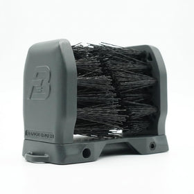 Range Brush hands-free cleaning on iron faces between shots.