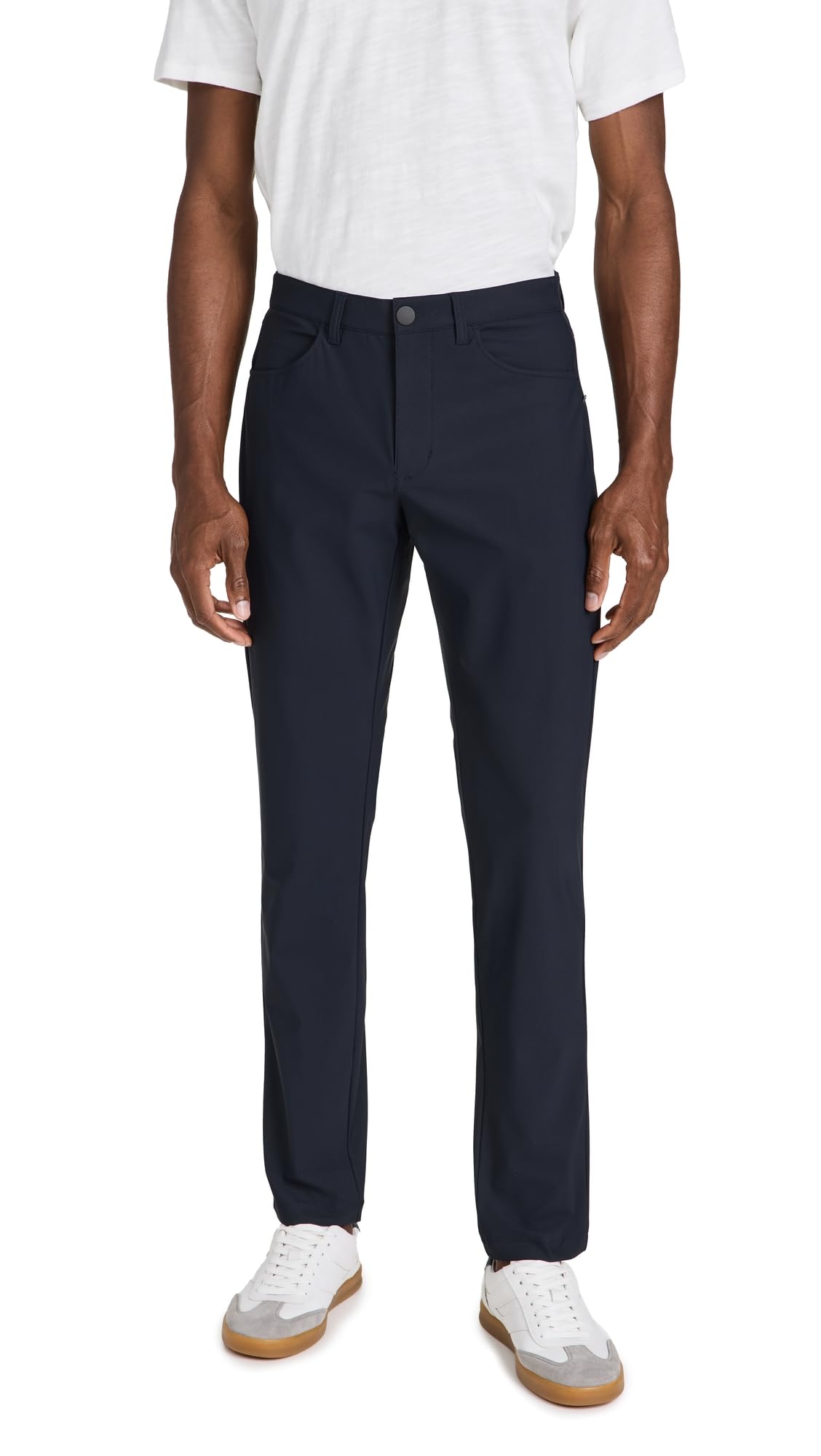 Rhone Momentum Golf Pants front view in true navy showing lightweight stretch.