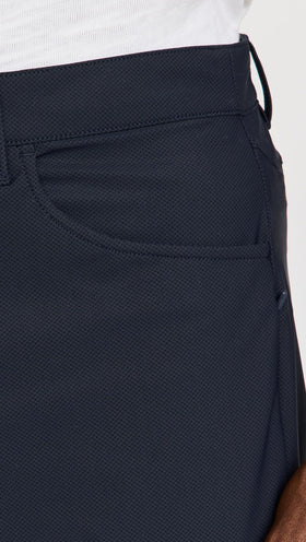 Rhone Momentum Golf Pants inseam view emphasizes tailored length for performance.