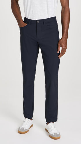 Rhone Momentum Golf Pants side view highlighting sleek silhouette and unrestricted movement.