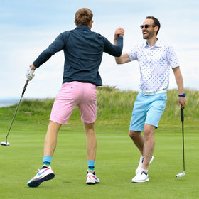 Royal & Awesome pastel pink golf shorts back view highlighting roomy fit for easy movement.