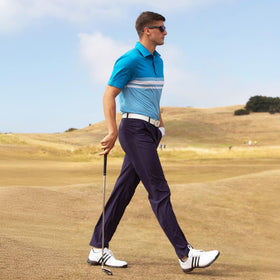 Royal & Awesome navy technical golf pants side view highlighting four-way stretch for mobility.
