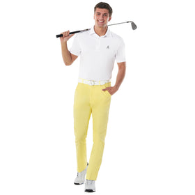 Royal & Awesome pastel-yellow golf pants showing zip-fly closure for quick on-course adjustments.