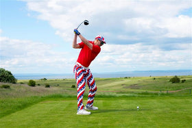 Side view of Royal & Awesome USA golf pants with tee loops and tour slit for golf convenience.