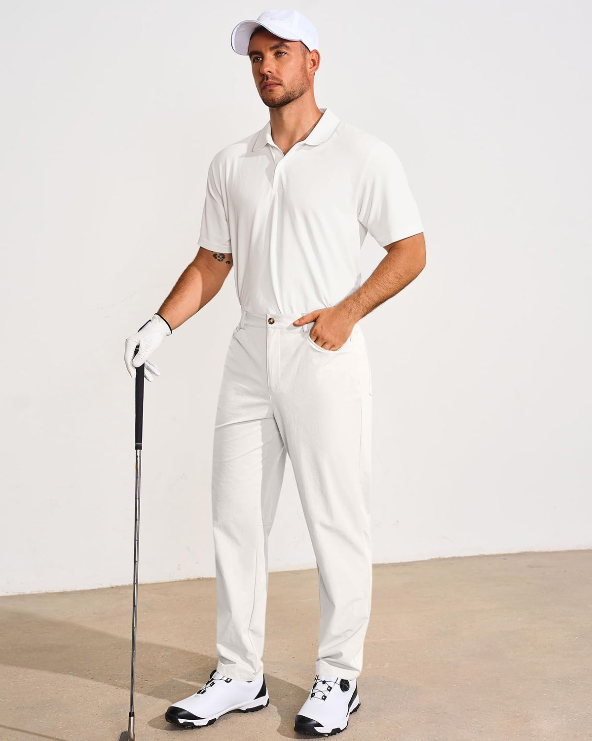 Runcati men's golf pants with back pockets for secure storage.