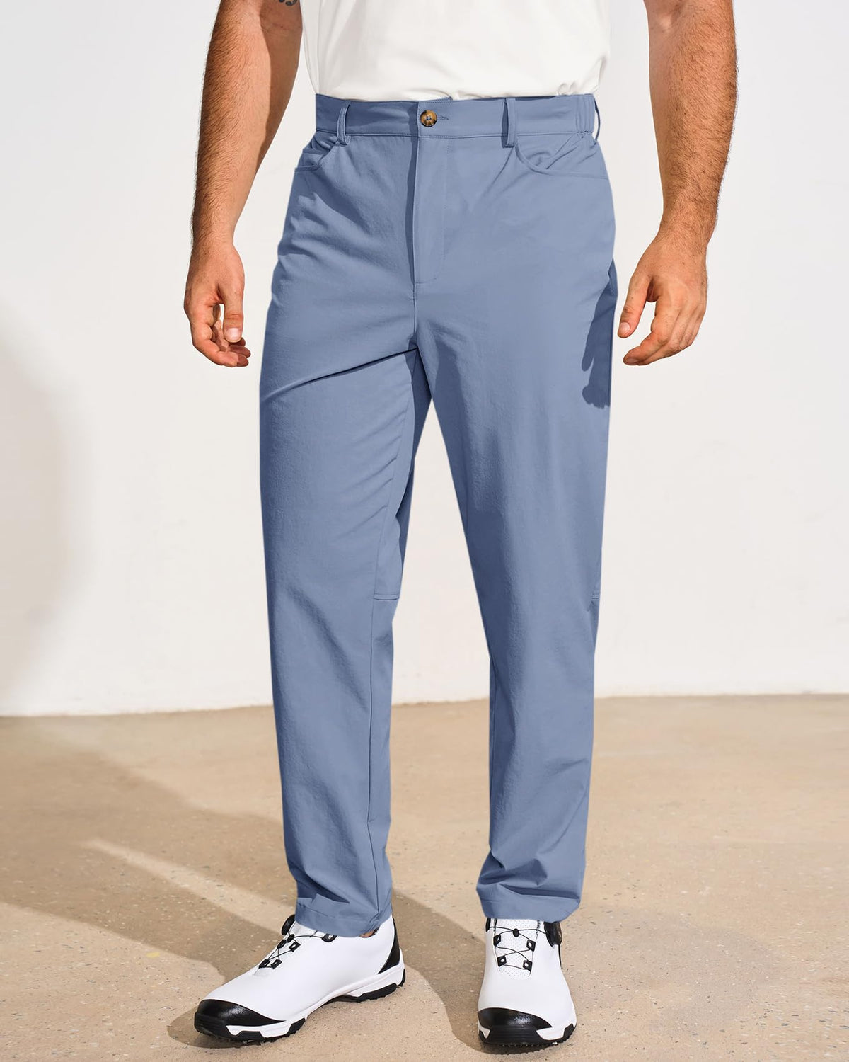 Runcati mens golf pants stretch fabric for easy movement on the course.
