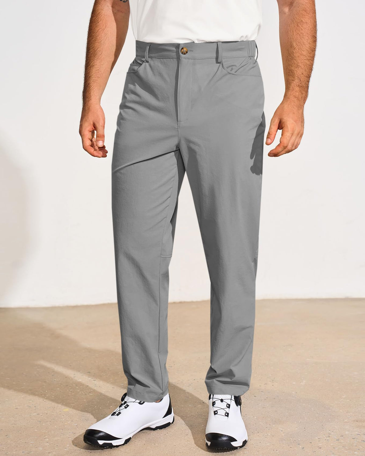 Runcati golf pants stretch waist close-up showing flexible fit for movement.