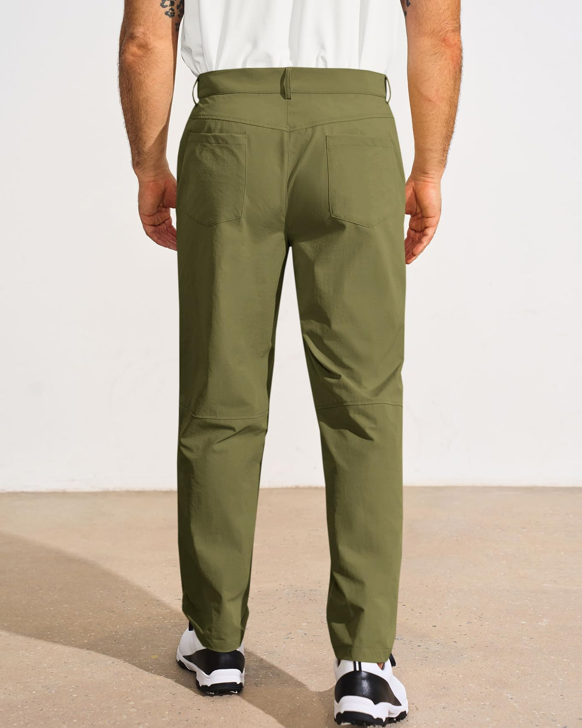 Runcati men's golf pants with zip-fly and elastic waist for a secure fit