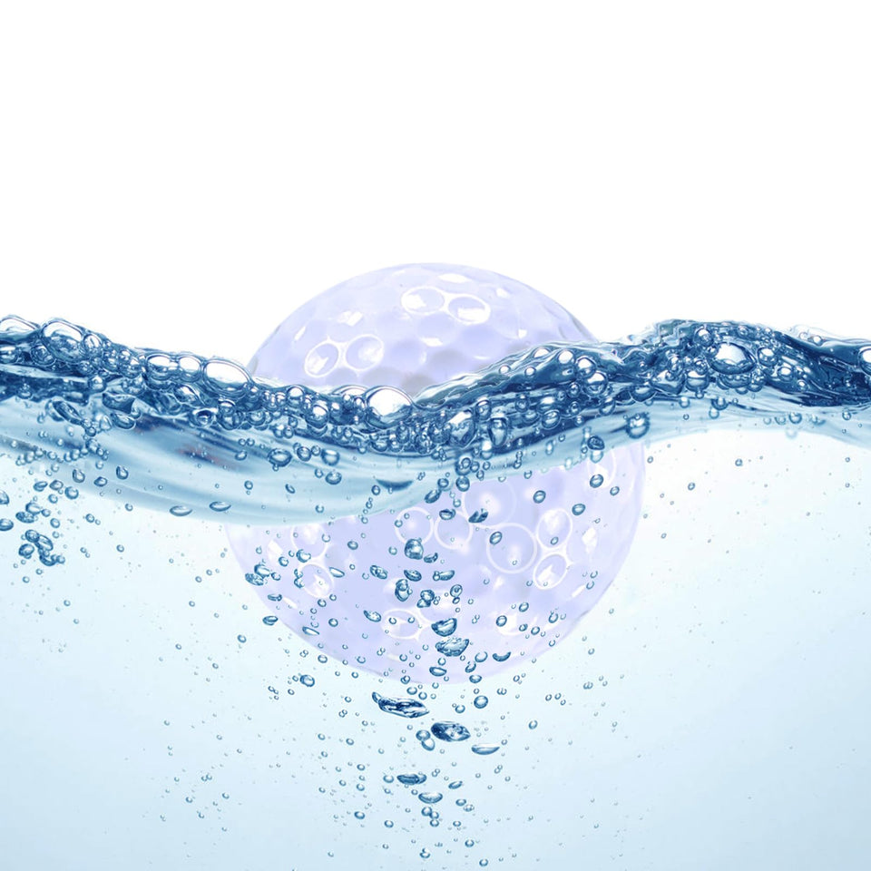 Sagsewful floating golf ball on water surface for quick retrieval in pools.