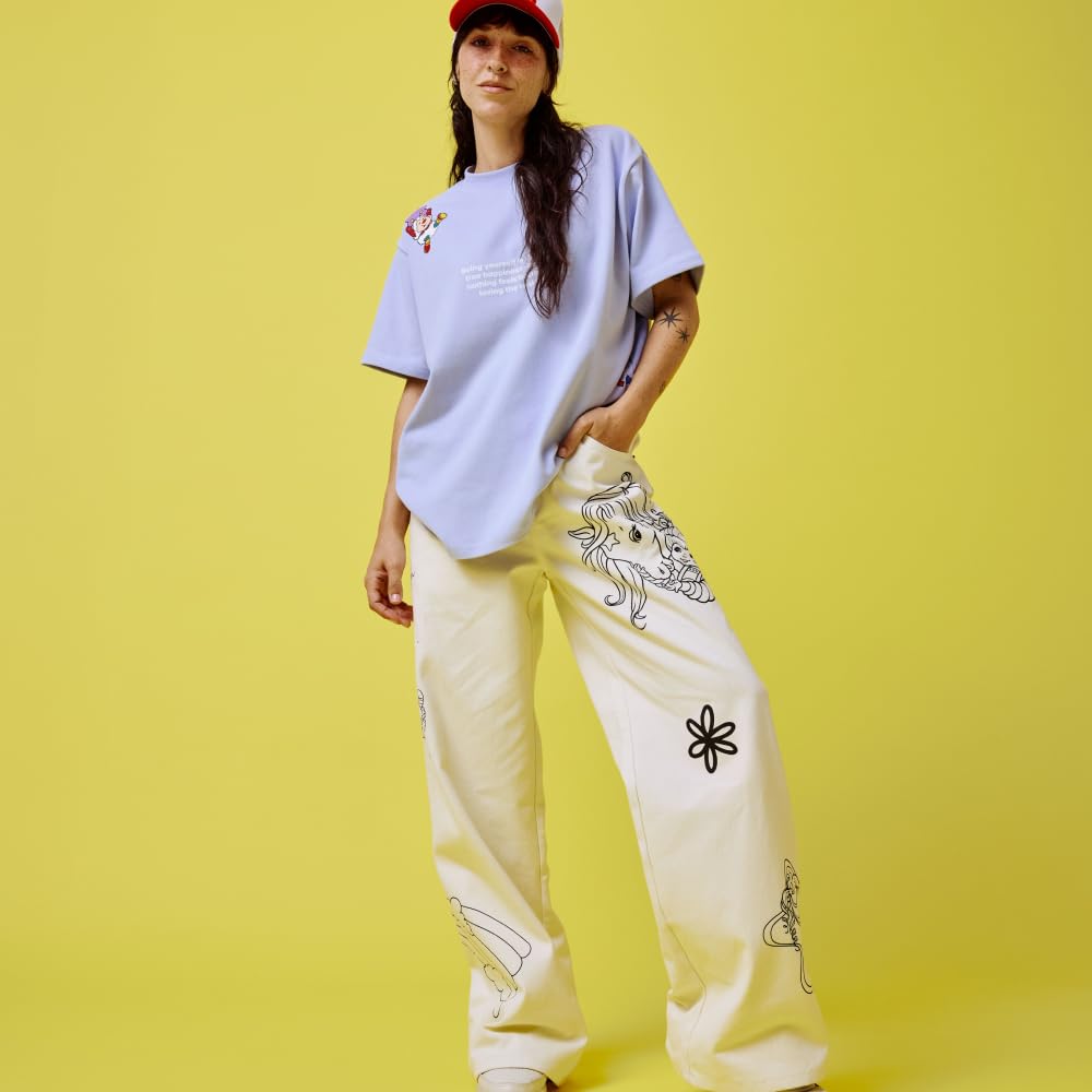 Samii Ryan Rainbow Brite canvas pant back view, featuring leg graphics for bold style.