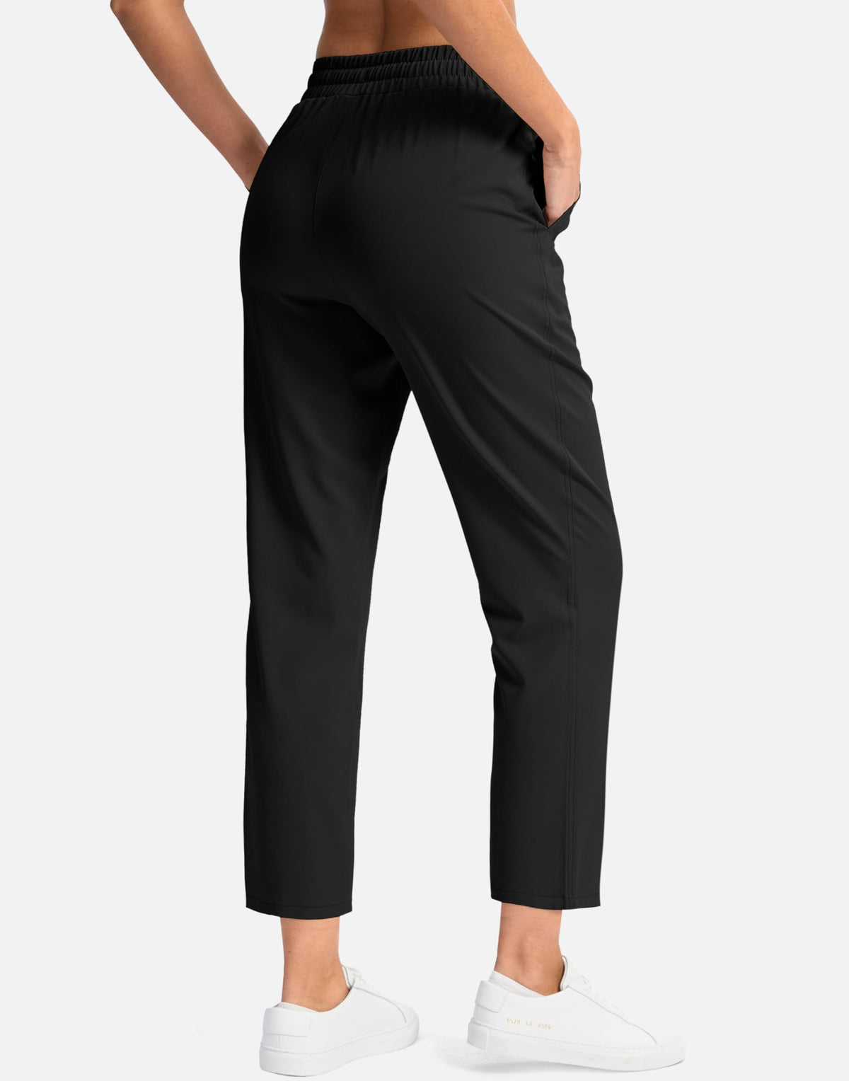 SANTINY pants with deep pockets demonstrating practical storage for essentials.
