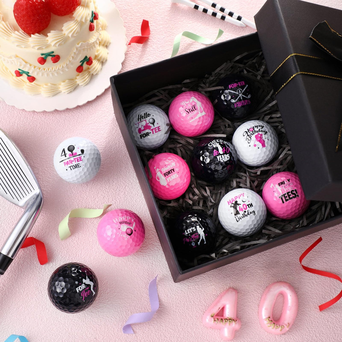 Seenelling woman golfer on the course celebrating a milestone with pink balls