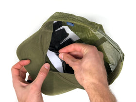 Trucker hat with vinyl barrier helps prevent sweat reaching eyes.
