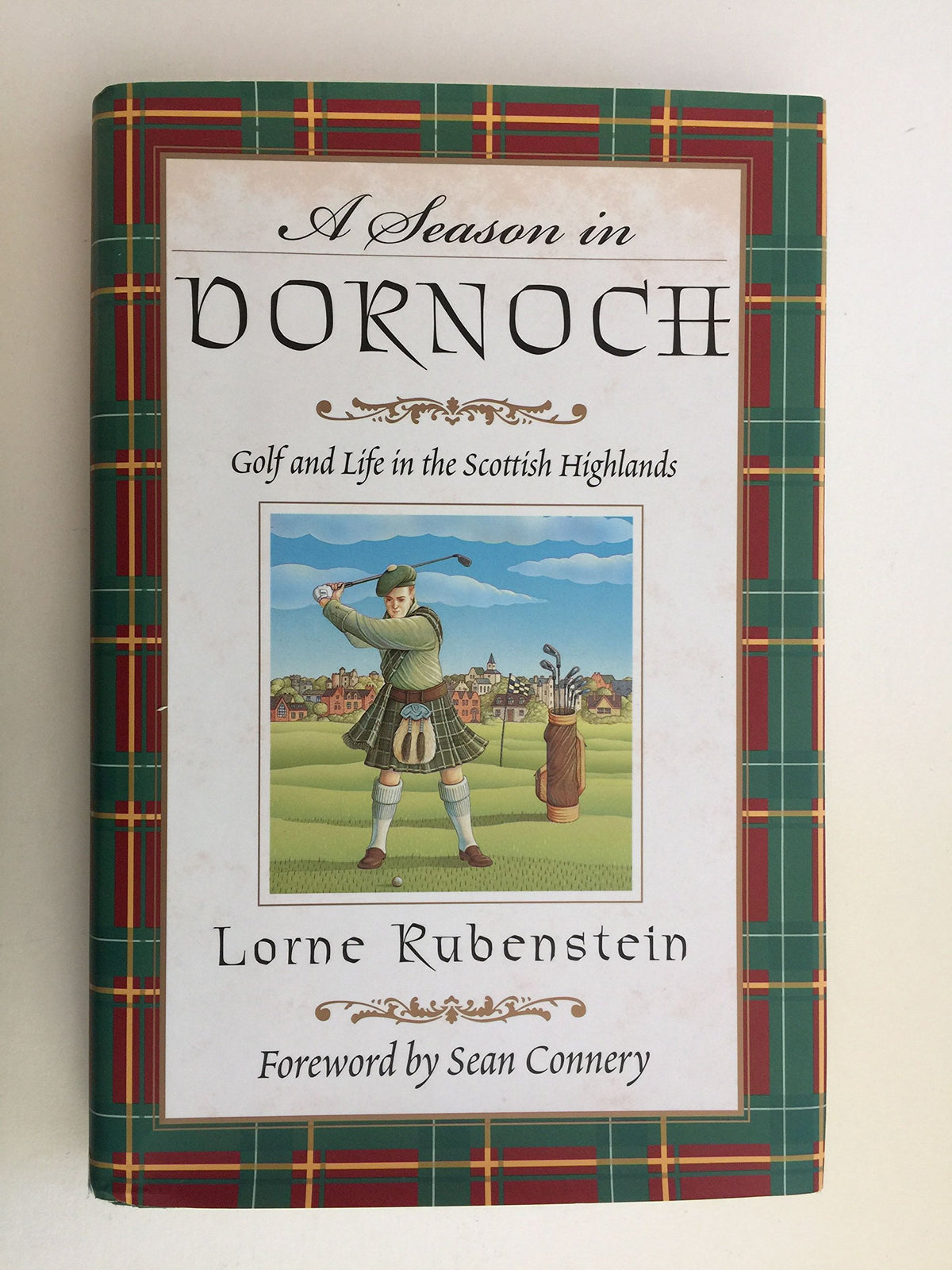 Simon and Schuster cover image for A Season in Dornoch, inviting golf lovers to Scottish Highlands storytelling.