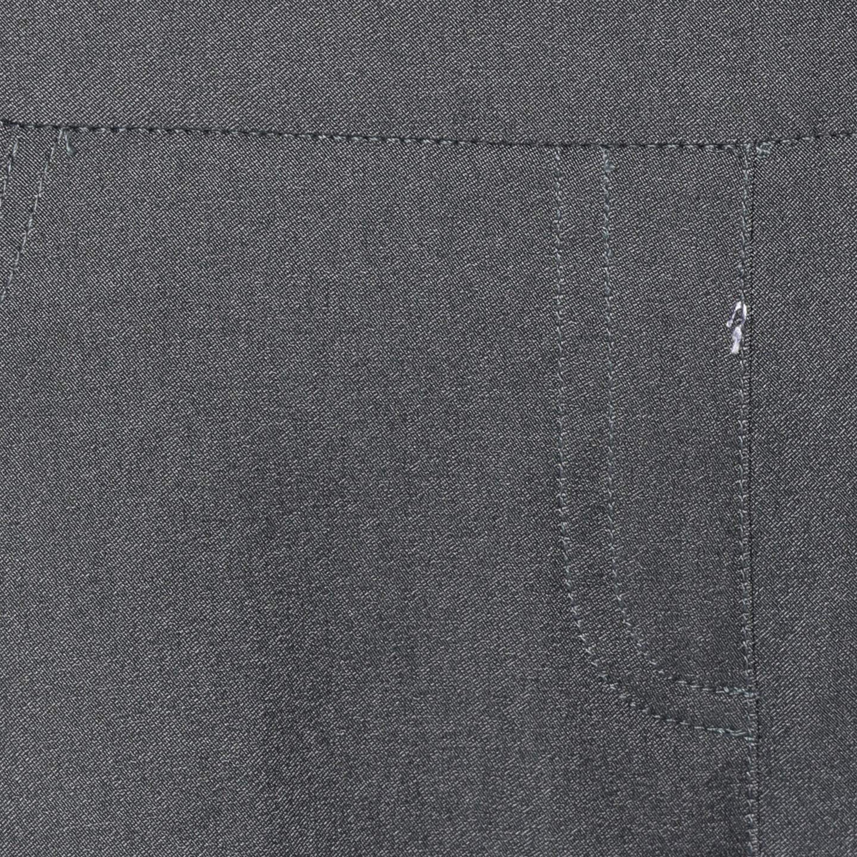 SLIM-SATION charcoal ankle pants provide versatile office-to-golf wear with wrinkle resistance.